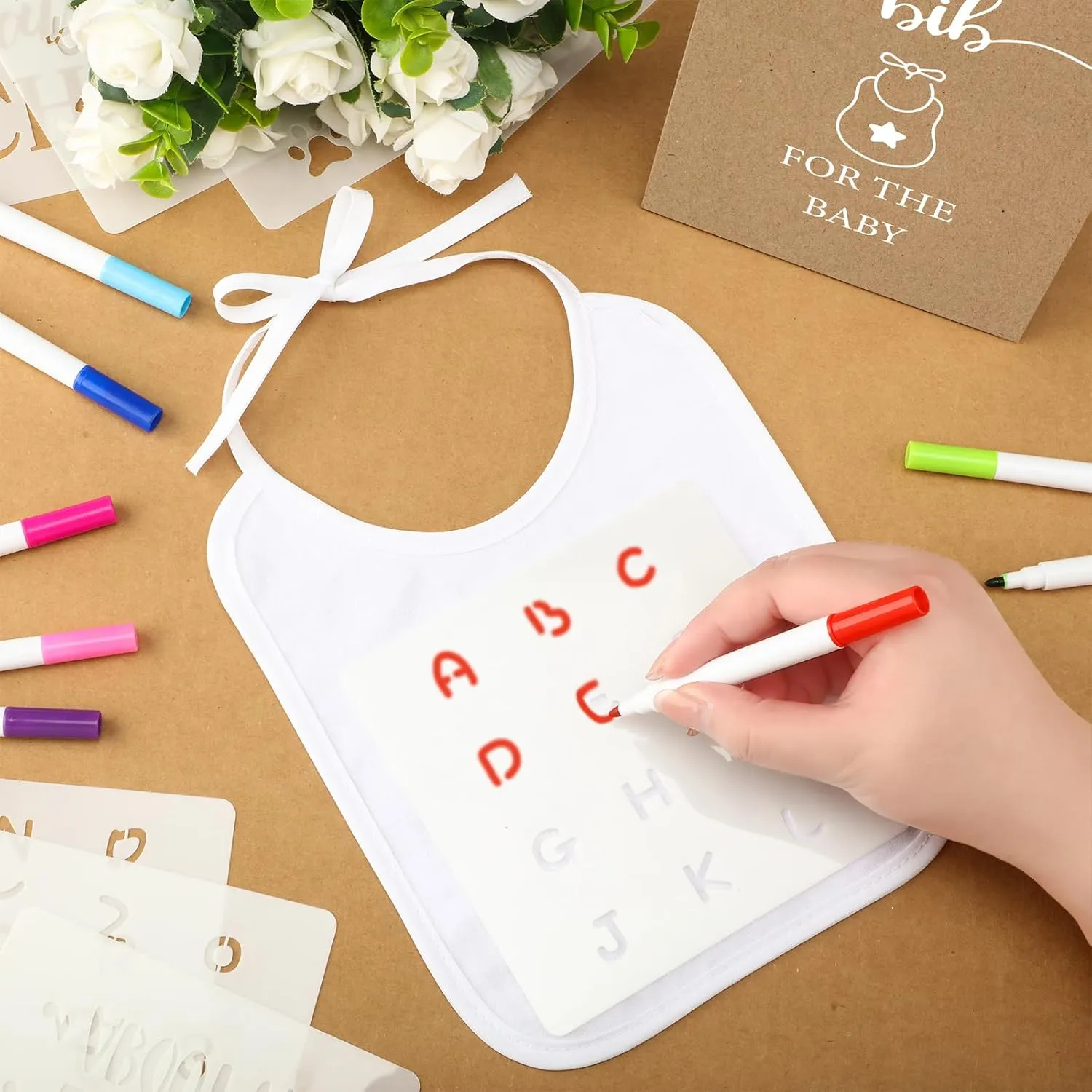 Panitay 100 Pcs DIY Baby Bibs Decorating Kit 50 White Bibs 25 Stencils 24 Fabric Markers 1 Baby Shower Game Sign