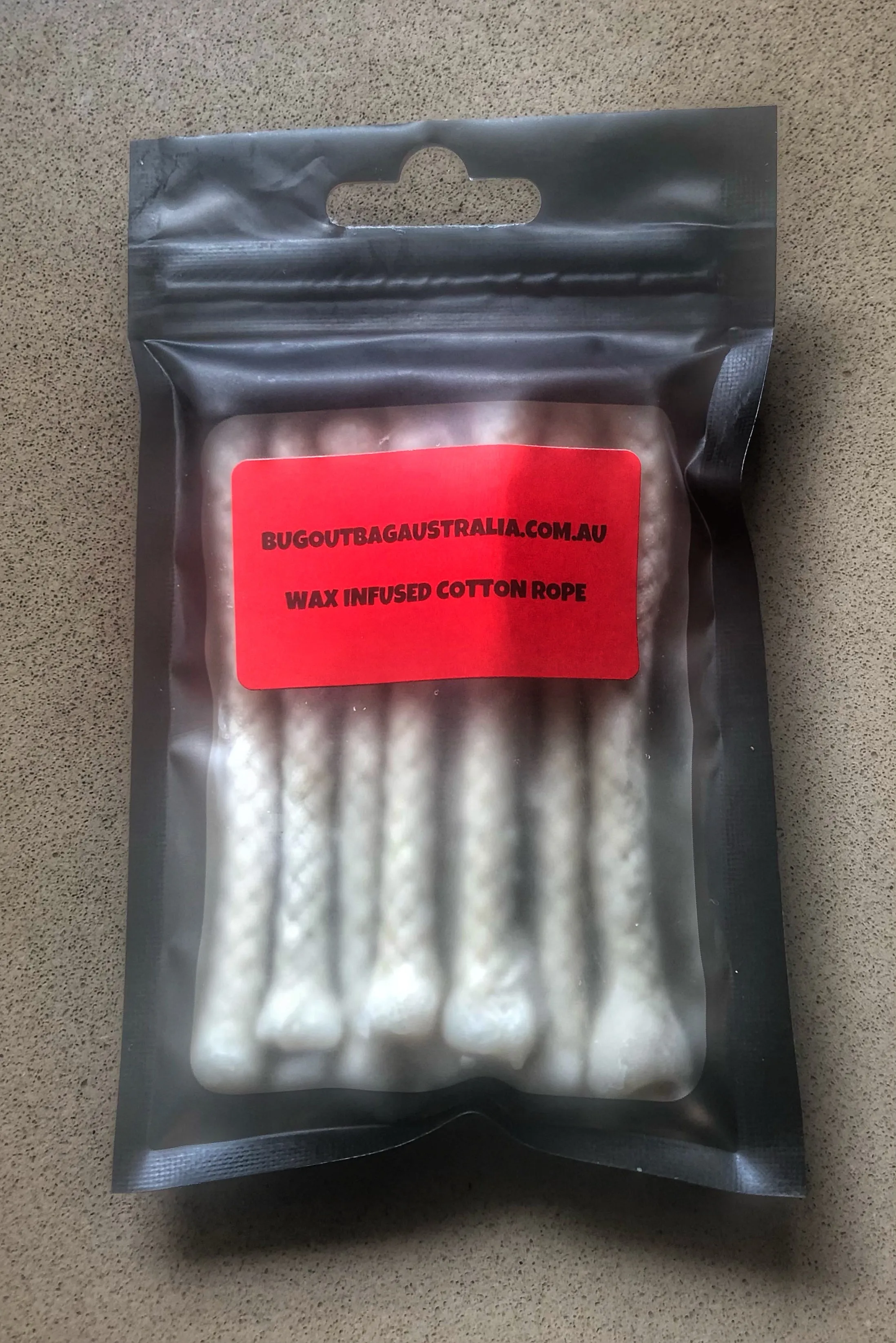 WAX INFUSED 100 PERCENT COTTON FIRE STARTERS.